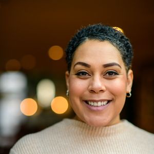 A photo of Leanne Graham smiling at the camera.