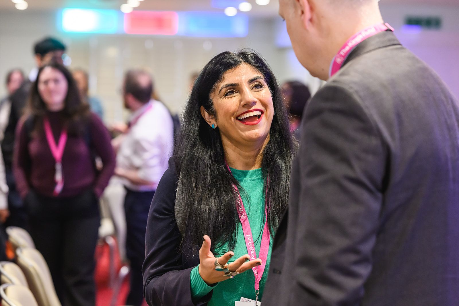 Delegates chatting to each other at a conference