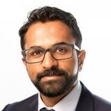 Headshot of Siva Anandaciva