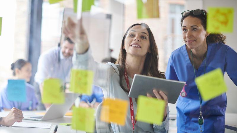 Image of clinicians in a brainstorming session