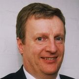 A headshot of Mark Newbold
