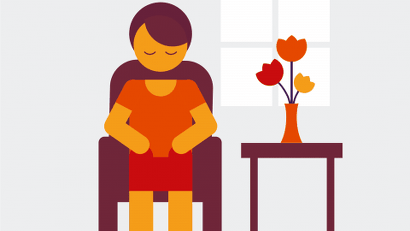 Person sitting in a chair