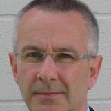 A headshot of Mark Jennings