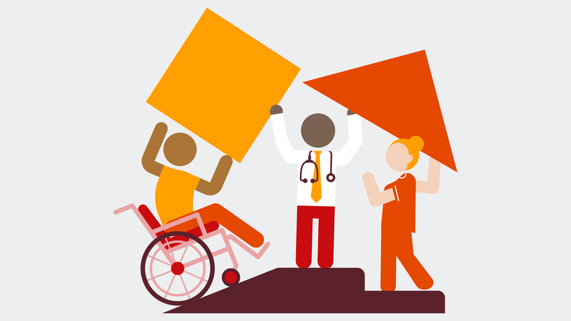 Three people working together to hold blocks