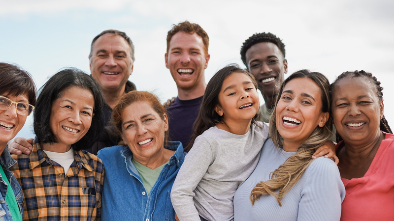 Image of a diverse group of people smiling