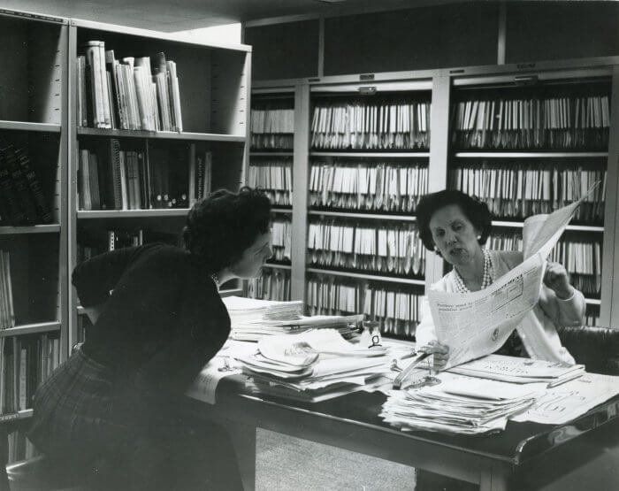 Photo of two women working in The King's Fund library